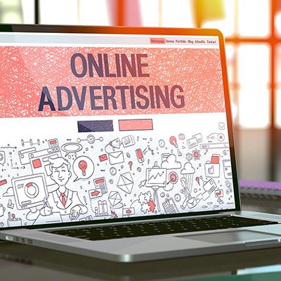 online advertising website on laptop thegem person